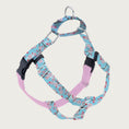 Load image into Gallery viewer, Dog harness with light blue base color with Asian style pink cherry blossom pattern, on straps on the front and sides; loop on dog's back is same color & pattern. Chest strap is light pink velvet. There are 2 black plastic clips, which fasten behind each front leg.