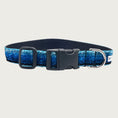 Load image into Gallery viewer, Blue gradient (light blue to deep blue) hued glitter 1" wide dog collar with a D-ring, black nylon inner webbing and black plastic buckle. The fabric itself is shimmery & glittery - it is not glued on.