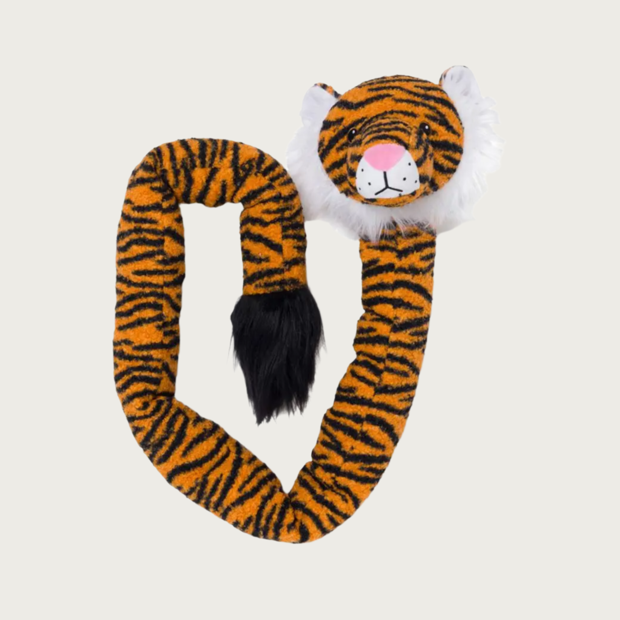 View of this toy in a coil, not knotted. Orange with black stripes, snake-like dog toy with a tiger head with white furry mane and cute face. Tail end of the toy has a large tuft of black furry fluff.