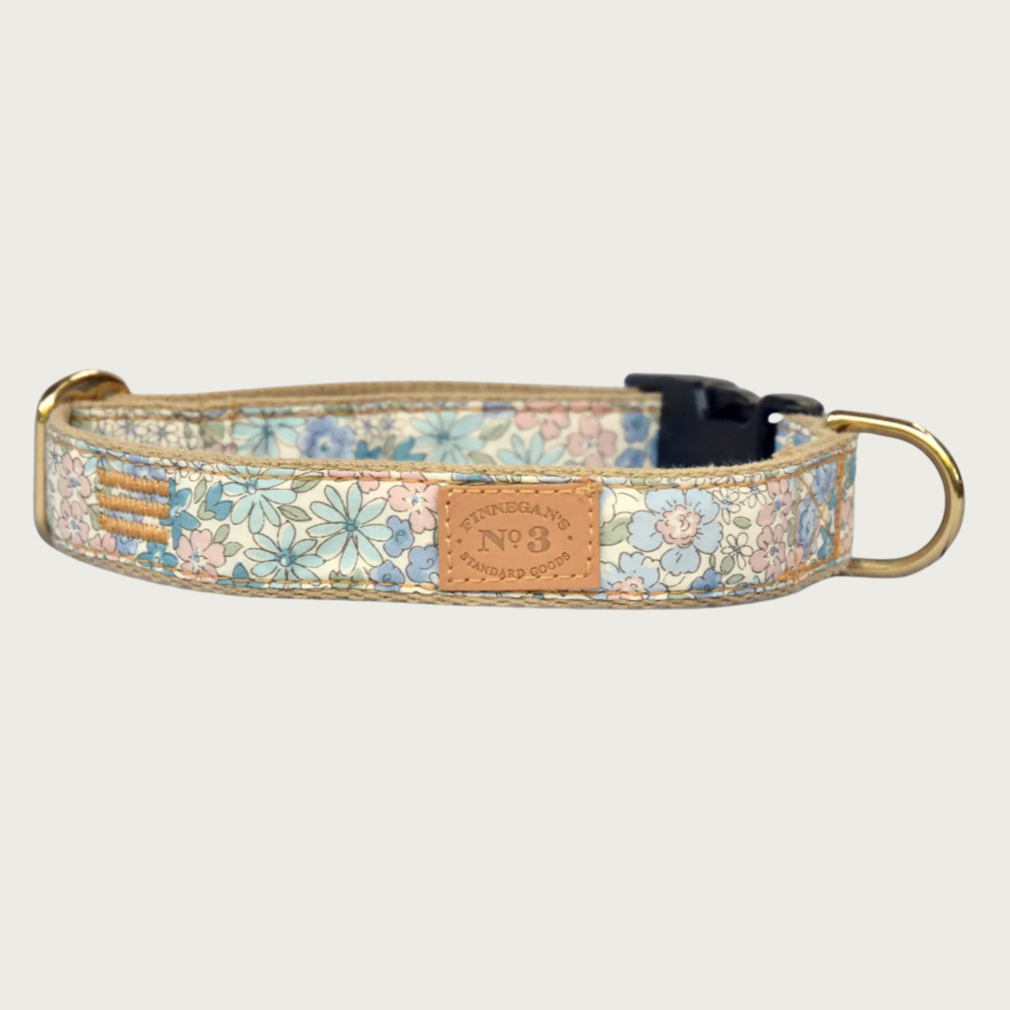Pastel blue, green, pink & cream floral patterned dog collar with a brass D-ring and black plastic buckle.
