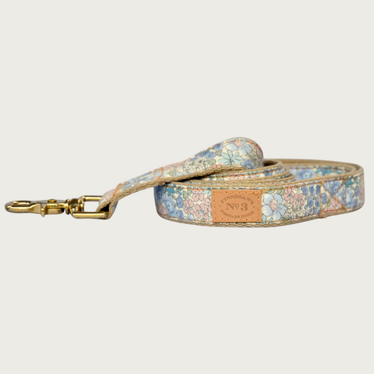 Pastel blue, green, pink & cream floral patterned dog leash with a brass claw-style clip.