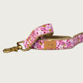 Load image into Gallery viewer, Dog leash with dense floral pattern in shades of pink, with a deep raspberry base color. Brass clasp.