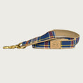 Load image into Gallery viewer, Plaid dog leash that's primarily navy blue & white, with brick red and yellow accents.