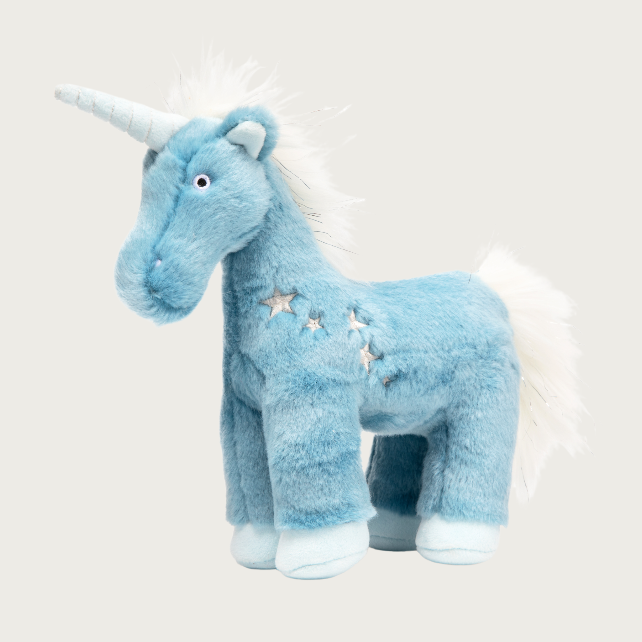 Light blue plush unicorn dog toy with four white stars around its left shoulder. It has a white horn, and mane & tail with shimmery silver threads.