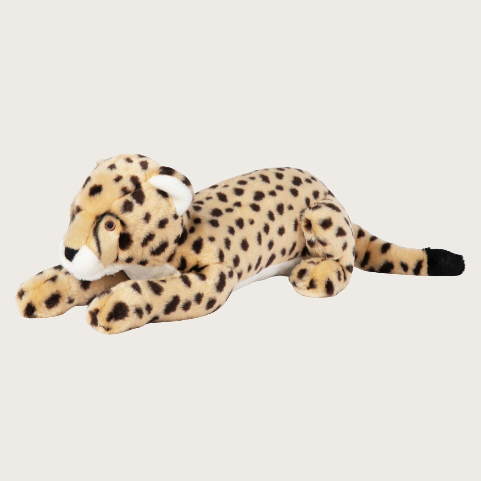Plush cheetah dog toy, laying on its belly with front legs stretched out in front, and a tail in back. It has a tan body with brown spots and embroidered facial details.