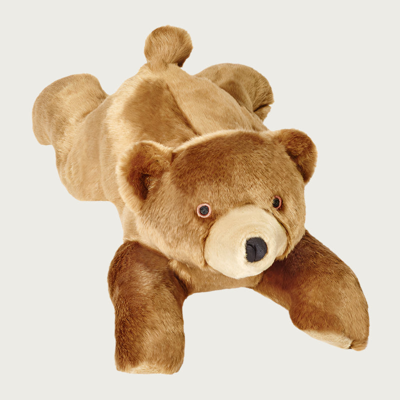 Plush Sadie Bear dog toy from Fluff & Tuff. Its front and back legs are outstretched, and its body is a warm brown with beige muzzle.