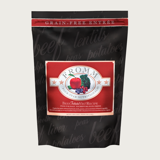 A 4 pound black and red bag of Fromm Beef Frittata Veg Recipe dog food. The banner on top of the bag reads "Grain-Free Entree".