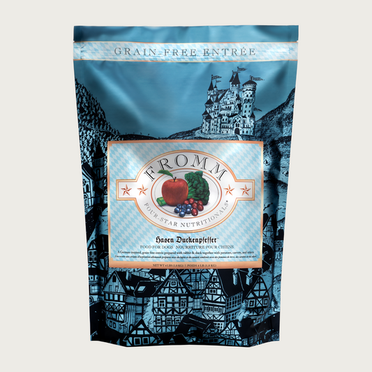 A 4 pound light blue and black bag of Fromm Hasen Duckenpfeffer Recipe dog food. The banner on top of the bag reads "Grain-Free Entree".