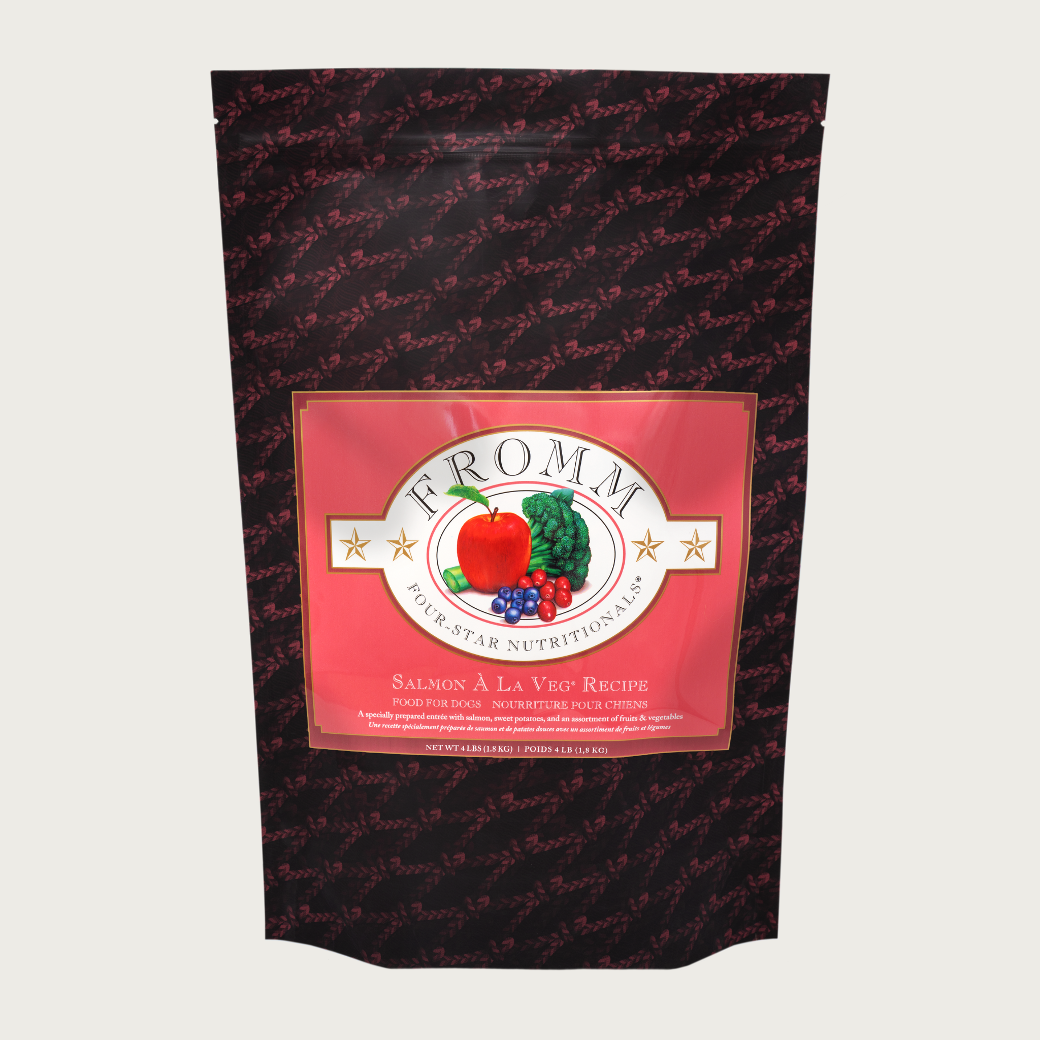 A 4 pound black and coral bag of Fromm Salmon A La Veg Recipe dog food.