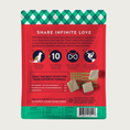 Load image into Gallery viewer, Rear view of the GivePet Santa Claws cat treat bag. It is red with green & white argyle border on top. Details of their shelter donation program are listed, along with ingredients and guaranteed analysis. There is a photo of 3 of the small, beige, rectangular shaped treats.