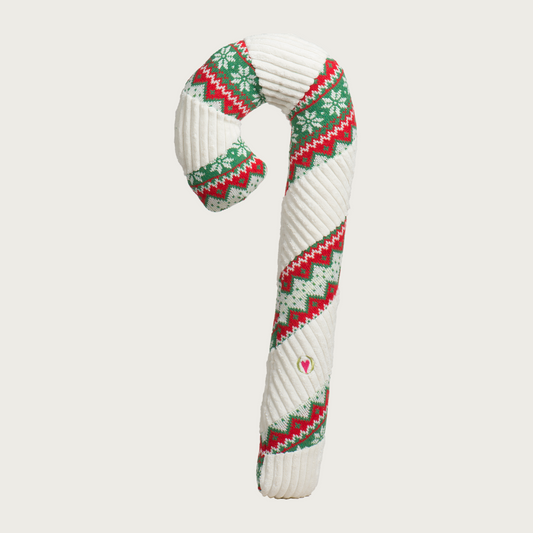 Plush candy cane shaped dog toy, with alternating cream corduroy and red, green, & cream Nordic print fabric.