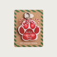 Load image into Gallery viewer, Red paw print pet collar charm on white background with "feliz naughty dog" text in large part of paw print.
