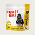 Load image into Gallery viewer, White resealable bag with bright yellow accents, of Mutt Gut Gut & Immune Mobility Functional Soft Chews for Dogs. Features an off-center photo of a dog's snout pointed up, with its tongue slightly sticking out. Relieves occasional joint stiffness. Pumpkin flavored. 60 count.