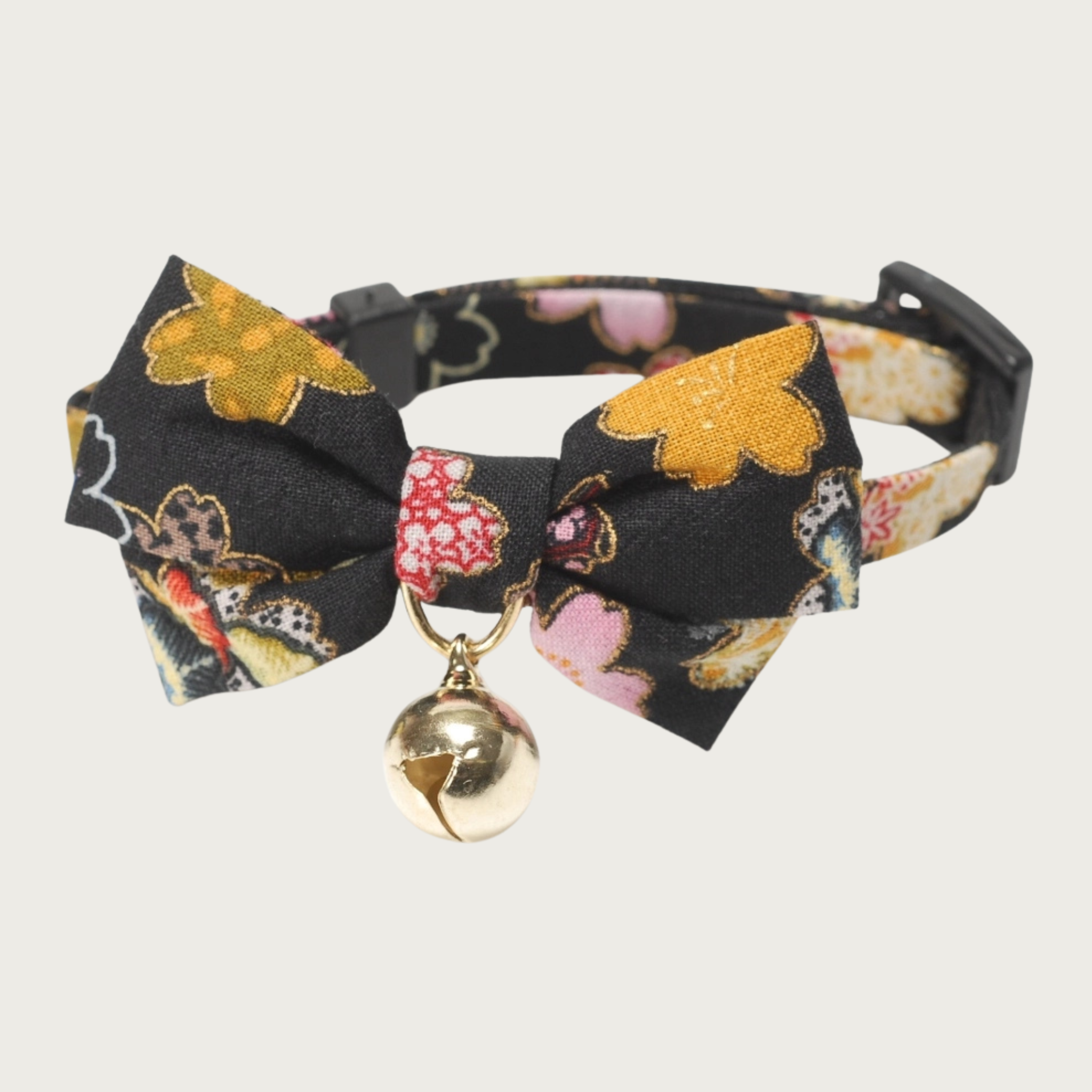 Asian-inspired black, gold and multicolor floral patterned bow tie cat collar with a gold bell.