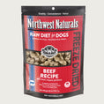 Load image into Gallery viewer, A 25 ounce bag of Northwest Naturals freeze-dried raw diet for dogs, beef recipe. Clear window on bag shows small cube-sized nuggets.