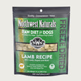 Load image into Gallery viewer, A 12 ounce bag of Northwest Naturals freeze-dried raw diet for dogs, lamb recipe. Clear window on bag shows small cube-sized nuggets.