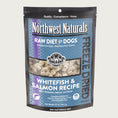 Load image into Gallery viewer, A 25 ounce bag of Northwest Naturals freeze-dried raw diet for dogs, whitefish and salmon recipe. Clear window on bag shows small cube-sized nuggets.