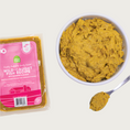 Load image into Gallery viewer, A close-up bowl of Open Farm's Gently Cooked Fish recipe, showing an orangey-beige colored, well blended & smooth food.