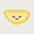 Load image into Gallery viewer, Yellow plush lemon wedge-slice shaped dog toy with an embroidered smiley face.