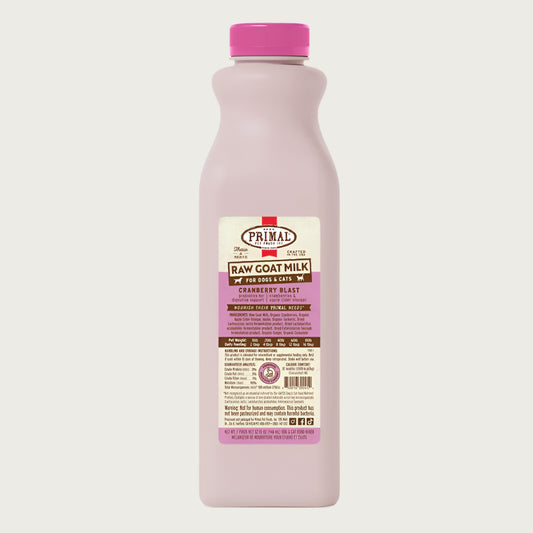 A 32 ounce plastic bottle of frozen Primal raw goat milk cranberry blast recipe for dogs and cats of all life stages, with probiotics for digestive support.