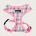 Load image into Gallery viewer, Plaid dog harness with a white base color, with black, gray, and pink plaid with pink trim on edges, with a black & white Puppia label in the center of the chest.
