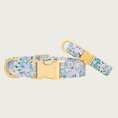 Load image into Gallery viewer, Two Flora dog collars with different widths (5/8" and 1"), with the smaller & more narrow collar leaning on the larger one.