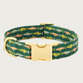 Load image into Gallery viewer, Pine green dog collar with pastel-hued fish pattern and gold-toned hardware.