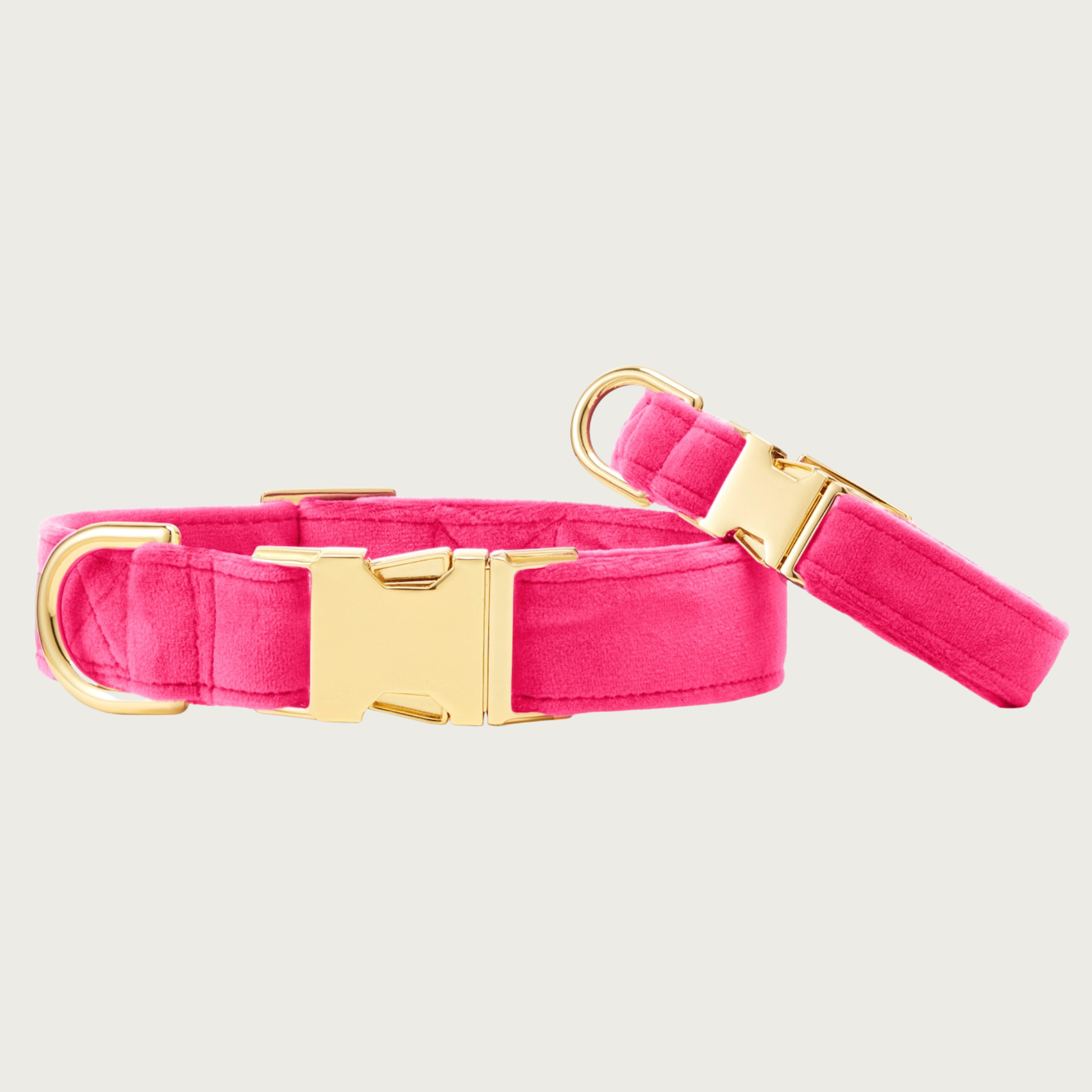 Two Hot Pink Velvet collars with different widths (5/8" and 1"), with the smaller & more narrow collar leaning on the larger one.