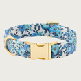 Load image into Gallery viewer, Blue floral dog collar with a white background. Various types of realistic -looking flowers are featured, in a range of blue tones. Gold-toned hardware.