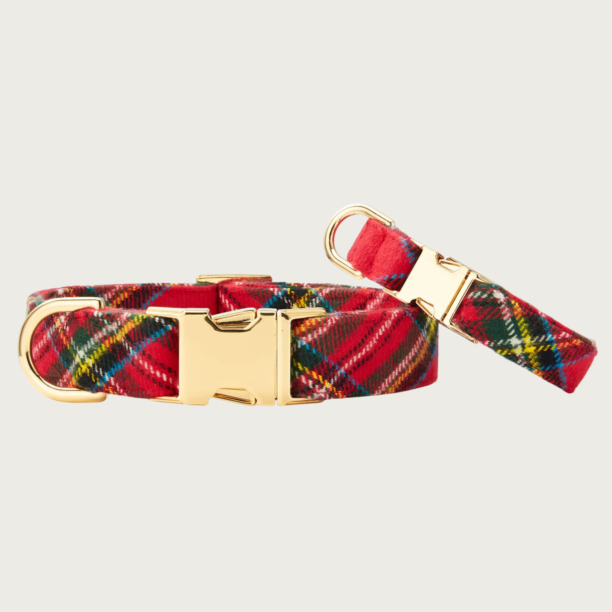 Pair of Tartan Plaid Flannel dog collars; 5/8" wide collar leaning on the 1" wide one, to show the size difference.