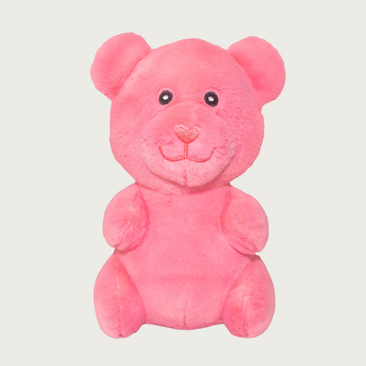 Plush, salmon pink dog toy that looks like a gummy bear.