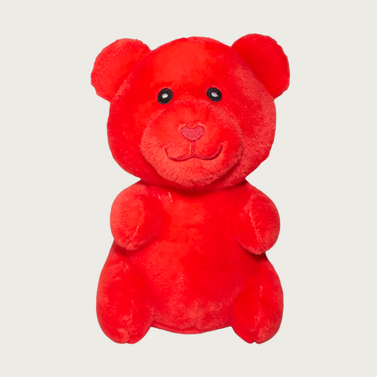 Plush, red dog toy that looks like a gummy bear.