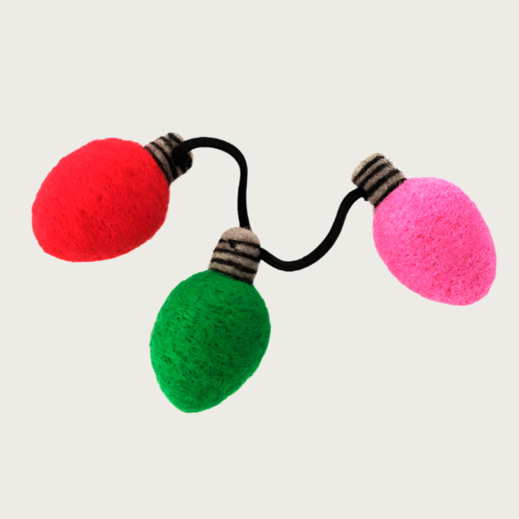 Colorful felt Holiday String Lights cat toy with red, green, and pink "bulbs" (3 total) on a black string.