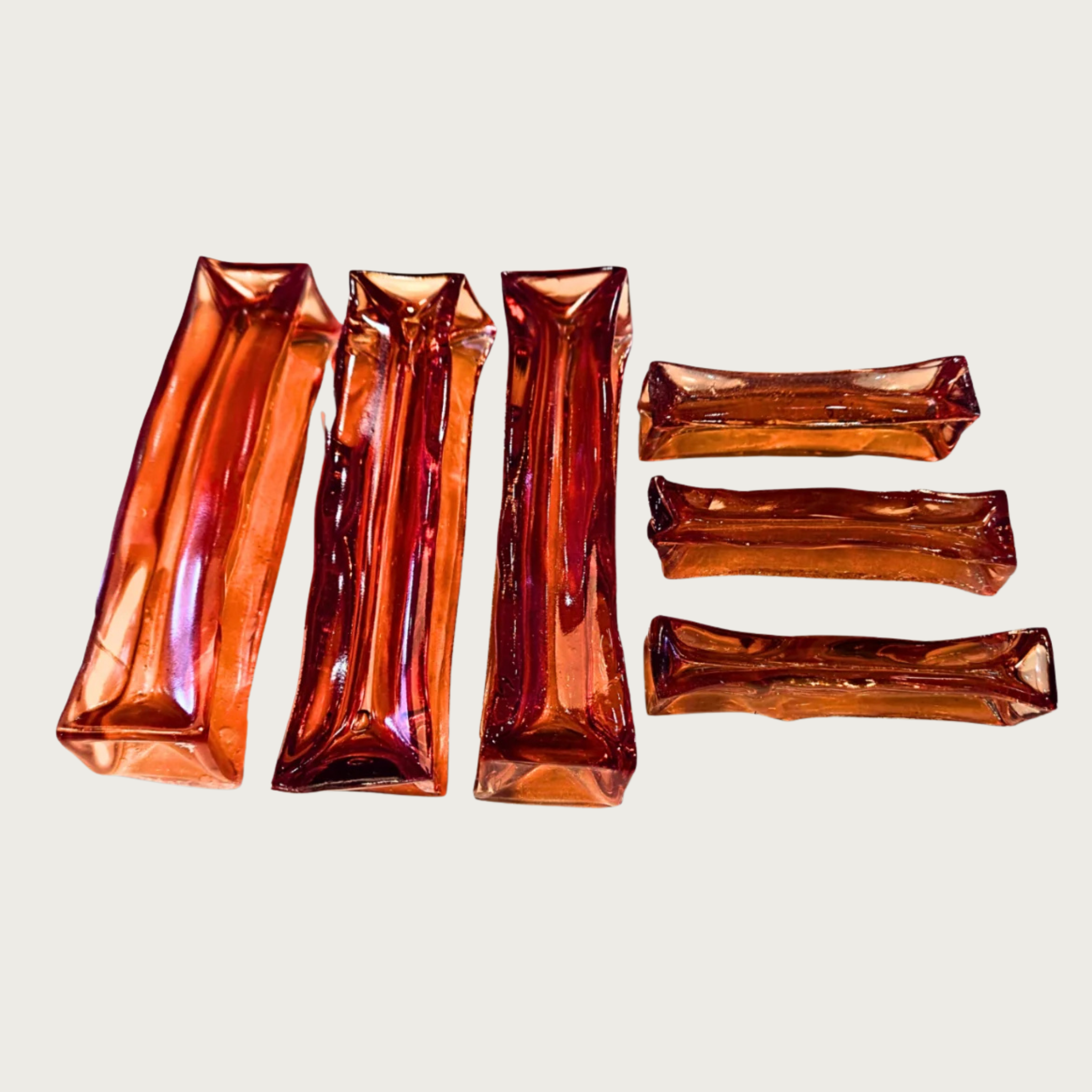 3 large and 3 small Bacon collagen chews, side by side to show size difference and shape variation. Jumbo is not pictured.