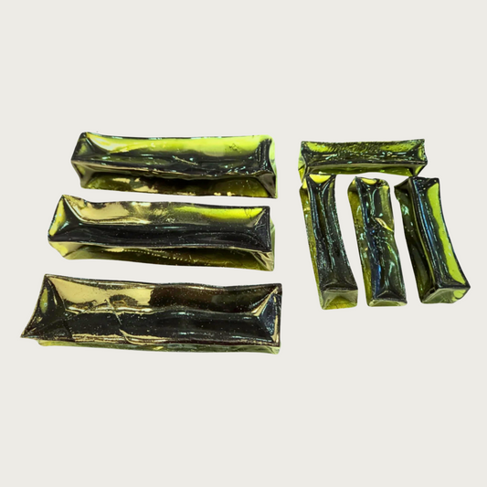 3 large and 3 small Spirulina Beef collagen chews, side by side to show size difference and shape variation.