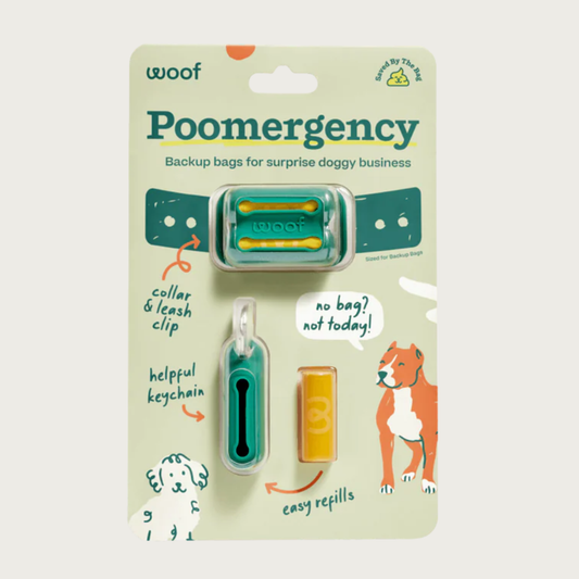 Poomergency-Green product in packaging. There is a green collar & leash clip with 2 slit openings, helpful keychain with 1 slit opening, and an example tightly rolled poop bag.