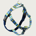 Load image into Gallery viewer, Dog harness with shades of blue & yellow-green striped straps on the front and sides; loop on dog's back is same color & pattern. Chest strap is navy blue velvet. There are 2 black plastic clips, which fasten behind each front leg.
