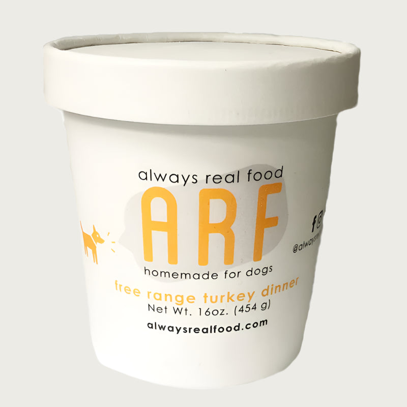 16 oz white carton with lid, of Always Real Food (ARF) Homemade for Dogs, free range turkey dinner.