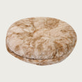 Load image into Gallery viewer, Side view of the Bagel Bed in Beige Rabbit. A ring of fabric goes along the center edge of the bed, hiding the zipper.