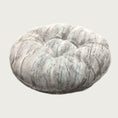 Load image into Gallery viewer, Round, plush pet bed made with faux fur in shades of light gray and cream in a subtle striped pattern.