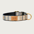 Load image into Gallery viewer, Dog collar with simple vertical striped pattern. Base colors are blocks of cream and beige, with narrow & widely spaced navy blue and white stripes.