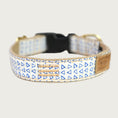 Load image into Gallery viewer, Dog collar with small, blue outlined triangle, repeating pattern with a creamy white base color.
