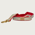 Load image into Gallery viewer, Dog leash with cream base color and black stripes, and red inner webbing.