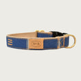 Load image into Gallery viewer, Dark denim blue dog collar with sparse tan vertical stripes.