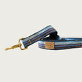 Load image into Gallery viewer, Dog leash with a serape blanket-inspired design, in rich shades of blue, brown and white.