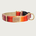 Load image into Gallery viewer, Dog collar with a serape blanket-inspired design, in bright shades of orange and red, with multi-colored accents.