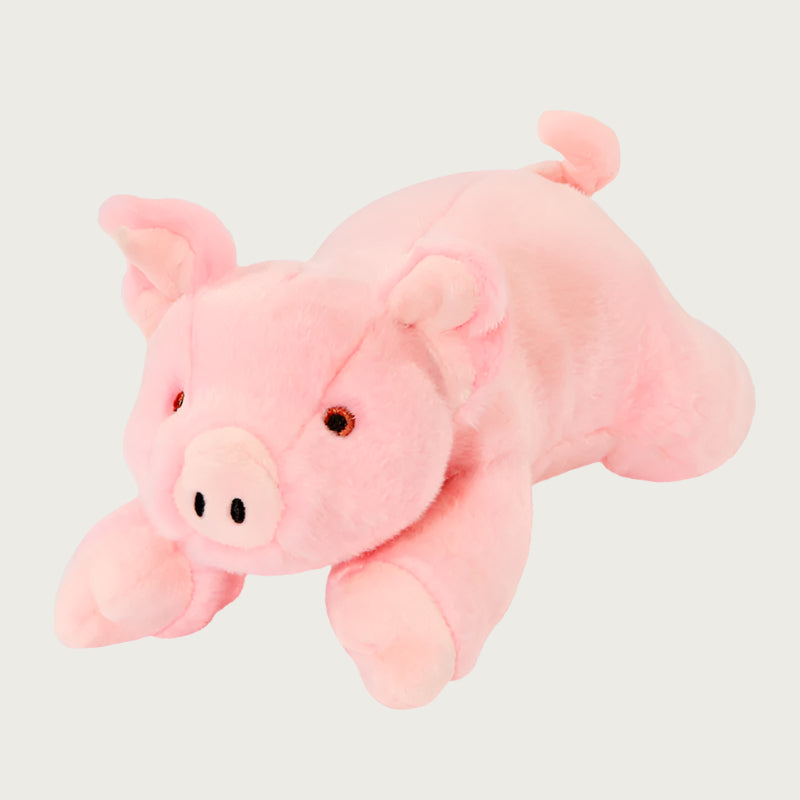 Plush Petey Pig dog toy from Fluff & Tuff. Toy is pale pink all over, with perky ears, cute snout and curly tail.