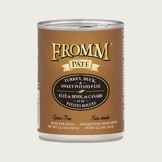 A 12.2 oz can of Fromm turkey, duck and sweet potato pâté dog food. Grain free.