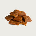 Load image into Gallery viewer, A close-up photo of a small handful of the Open Farm Turkey dog treat. They are rectangular brown pieces that look like jerky, about 1"-2" long and 1/8" thick.