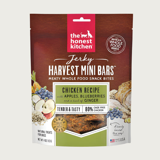 4 oz bag of Harvest Mini Bars from The Honest Kitchen, meaty whole food snack bites, chicken recipe jerky dog treats. 80% cage free chicken. Tender & tasty. Human grade. Small transparent window on front shows product inside: reddish brown squares.